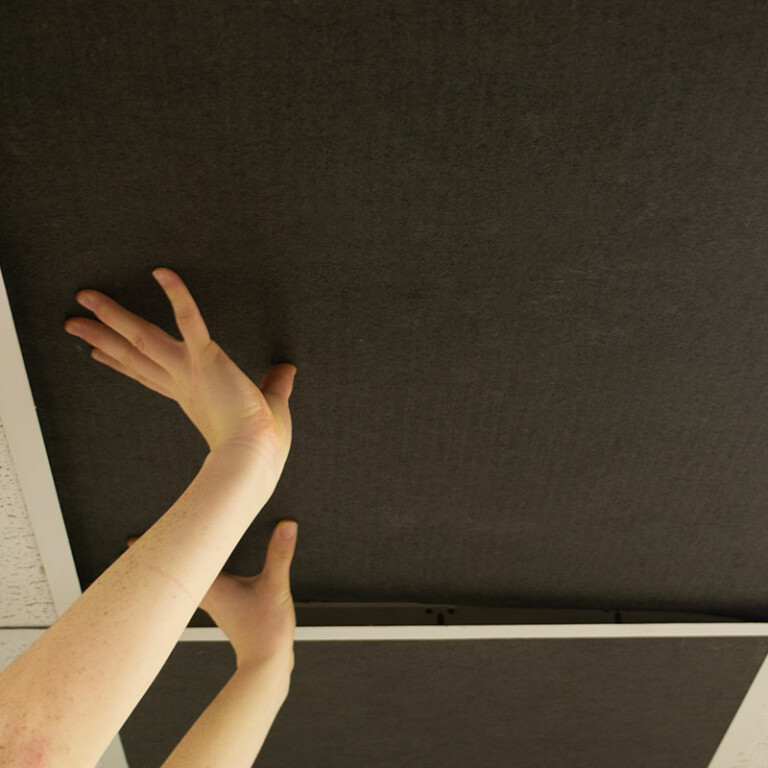 Installation of Black Acoustic Ceiling Tile